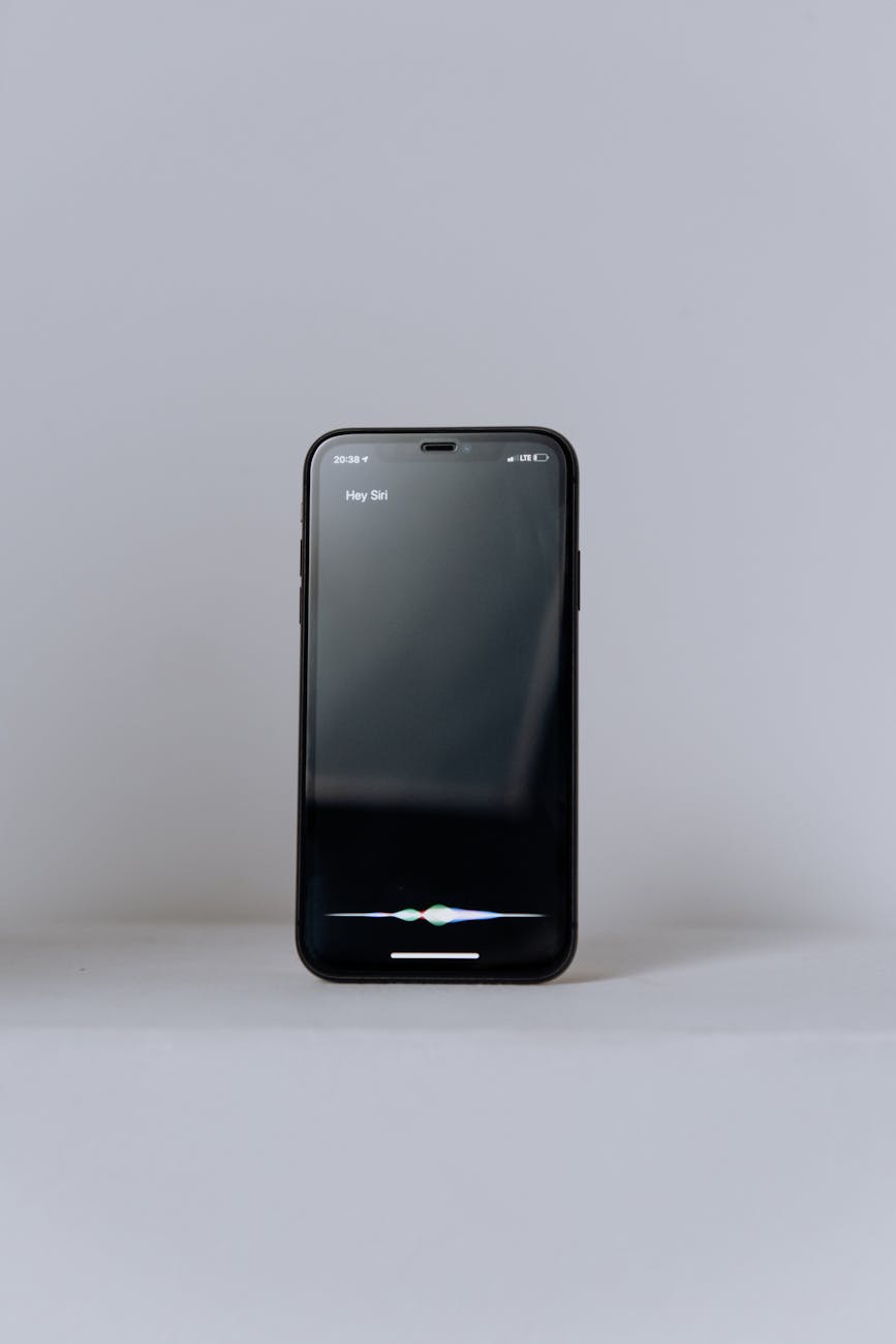 black samsung android smartphone on white table